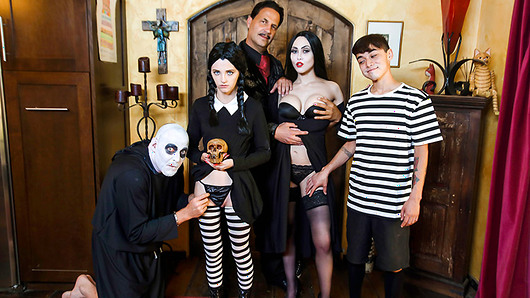 This Halloween, the Addams Family is going through a crisis! But when Morticia looks a hell of a lot like Audrey Noir, and Wednesday bears a striking resemblance to Kate Bloom, what can you expect? Everyone seems to be getting down and dirty around the old haunted mansion, and the head of the Addams Family, Gomez, is not too happy about it. So, the ghouls solve the problem the only way a supernatural family knows how, they head to the master bedroom and have an undead orgy! Wednesday gets pounded by her horny stepdad while Morticia the MILF enjoys her stepsons hard cock. Even their not quite uncle Fester gets in on the nasty fun. Happy Halloween! Milf porn featuring: Audrey Noir, Kate Bloom.